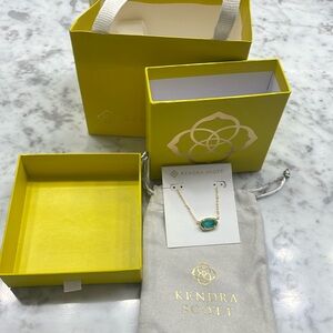 Kendra Scott faux emerald necklace comes with jewelry bag, box and bow